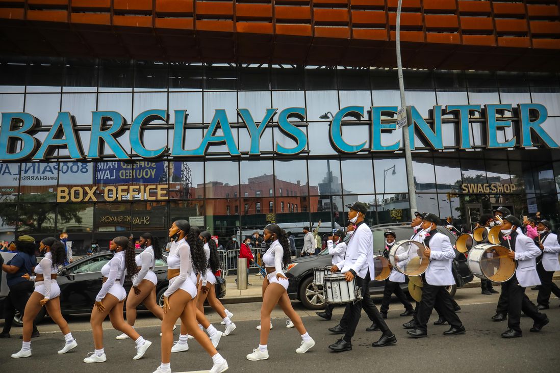 Voters outside Barclays Center, as well as a drumline and dancers